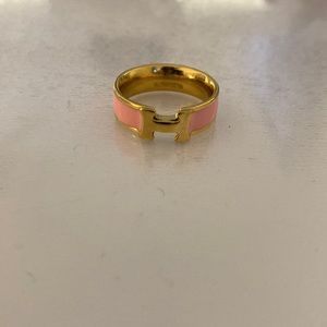 Pink and gold H ring